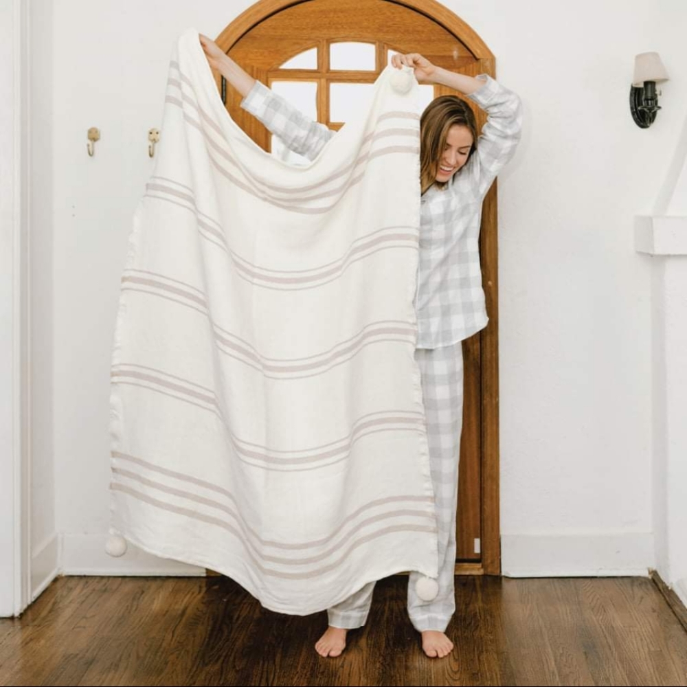 Imani collective aritisan made cream throw